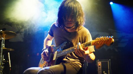 SHEFFIELD, UNITED KINGDOM - MARCH 24: Takaakira "Taka" Goto of MONO performs on stage at the Corporation on March 24, 2009 in Sheffield, England. (Photo by Gary Wolstenholme/Redferns)