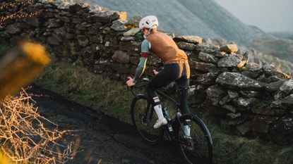 rider climbing out the saddle