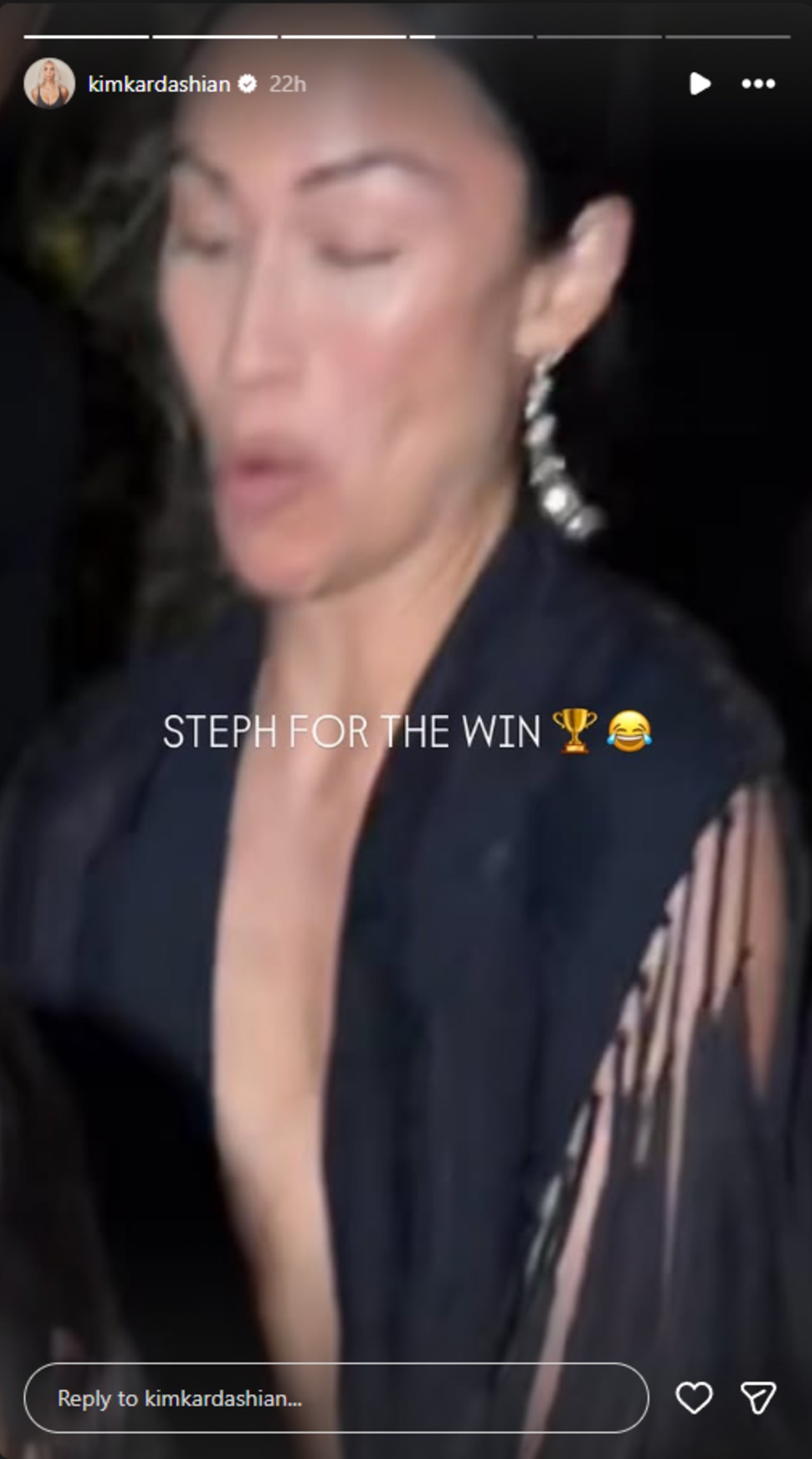 A close up of Kim's friend trying to catch her.