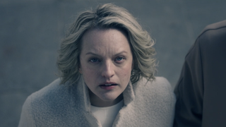 Elisabeth Moss as June watching Hannah in The Handmaid's Tale