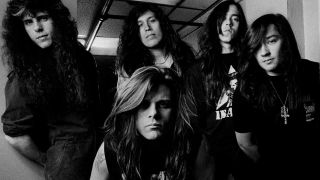 Testament posing for a photograph in 1990