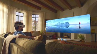 Apple Vision Pro being used in living room with AR screen in front