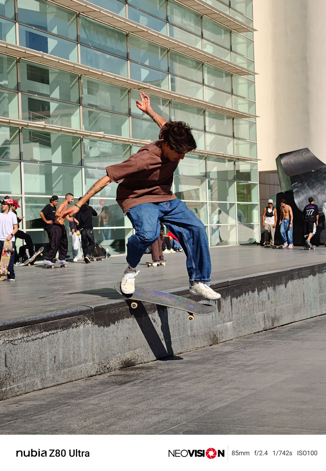 A skateboarder pulling a trick