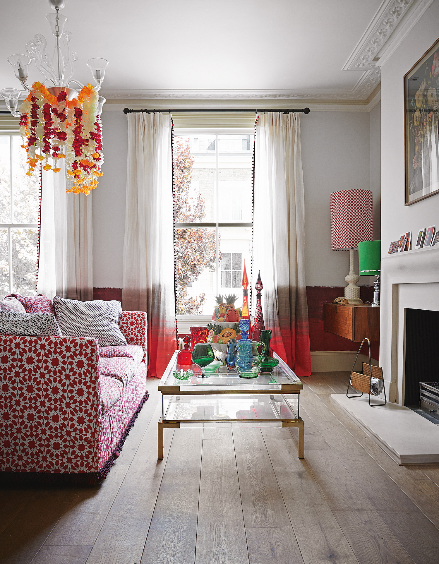 white living room with sheer curtains