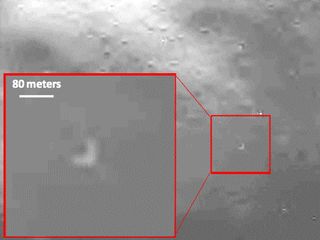 An image taken by the LCROSS shepherd spacecraft shows the impact site where a spent rocket stage slammed into the moon minutes before.