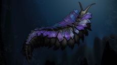 An underwater worm with purple and blue scales