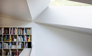Light floods into the interior of the houses through skylights