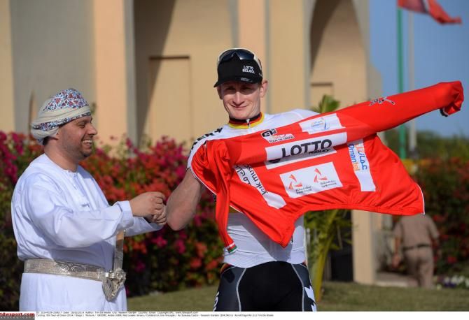 Stage 1 winner Andre Greipel (Lotto Belisol) dons the leader's jersey at the Tour of Oman
