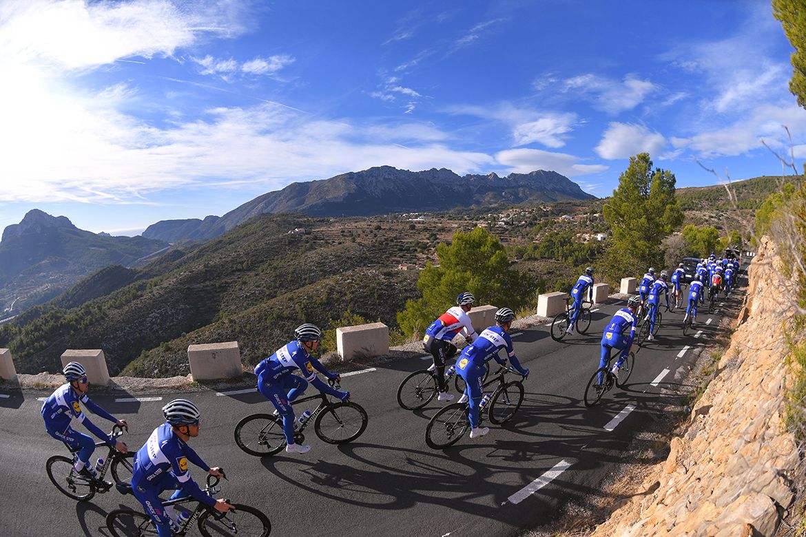 The riders climb