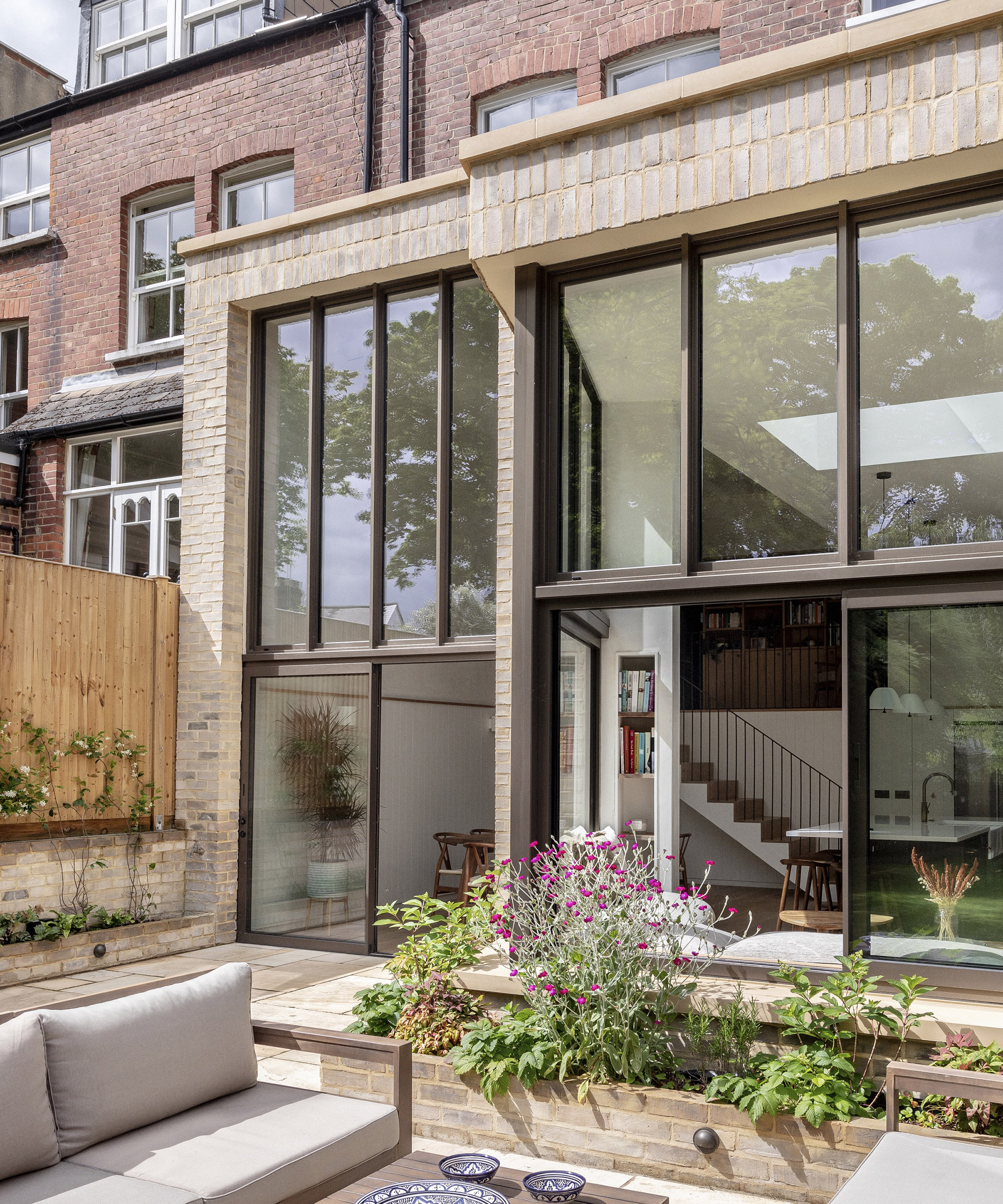 Exterior kitchen extension with double height glazing