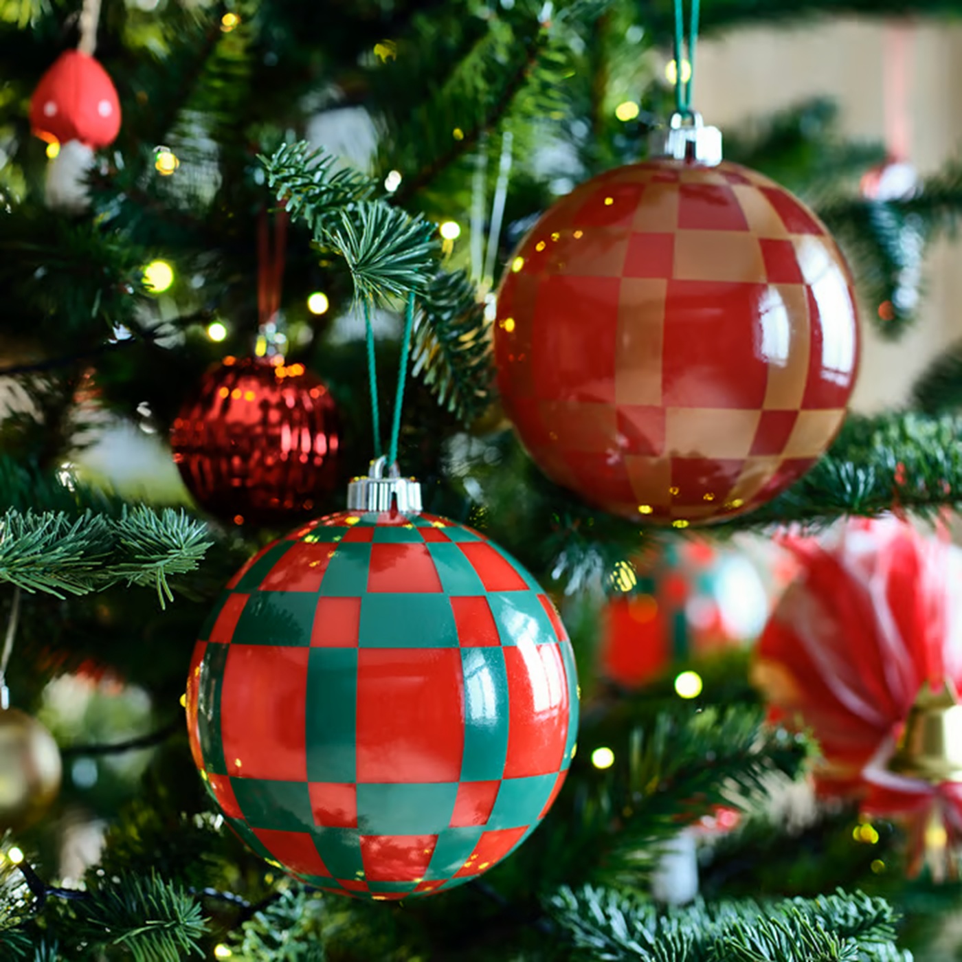 christmas tree decorated with oversized baubles by IKEA