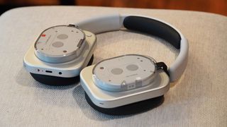 The Nothing Headphone 1 lying on a stool showing the design and ports.