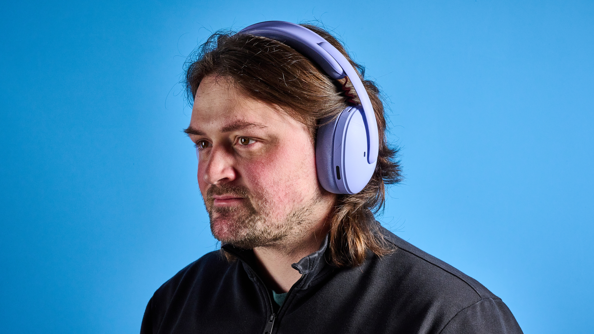 A lilac Logitech G325 Lightspeed wireless gaming headset