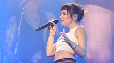 Lily Allen singing on stage