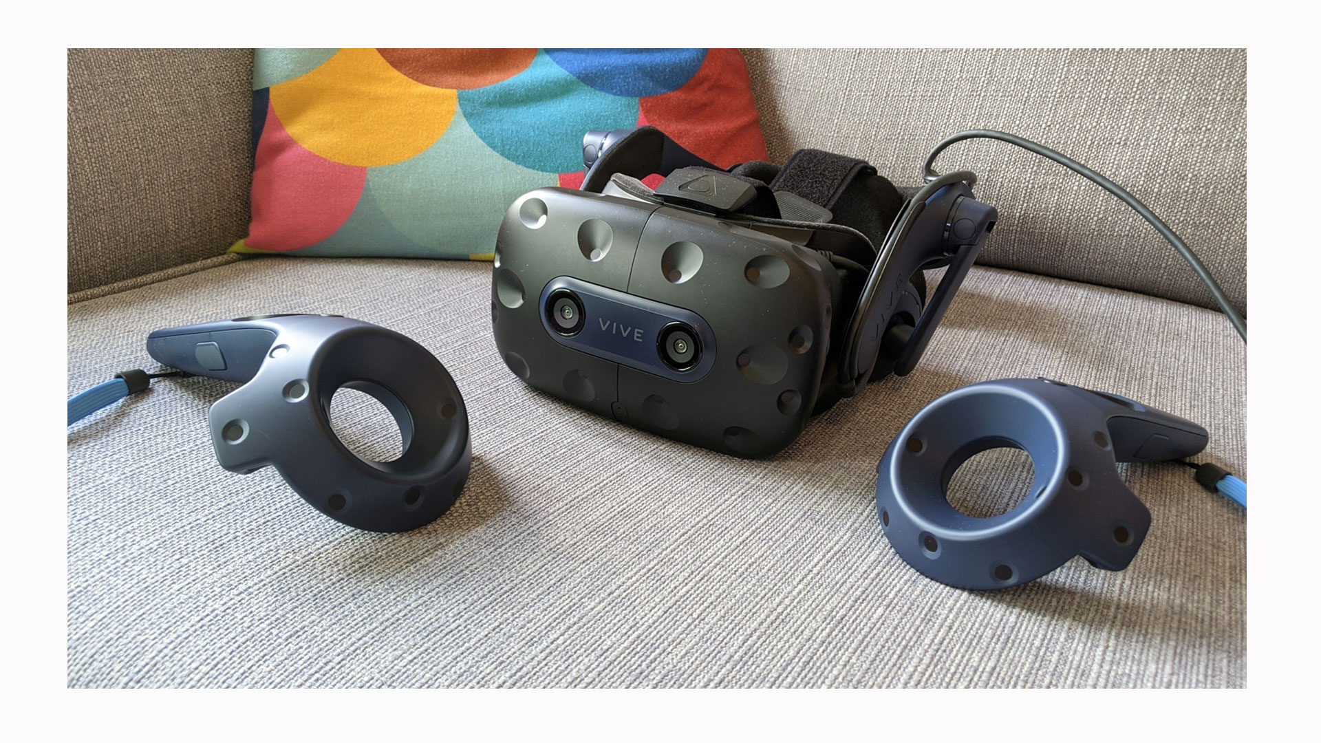 Image shows the HTC Vive Pro 2 headset and controllers,