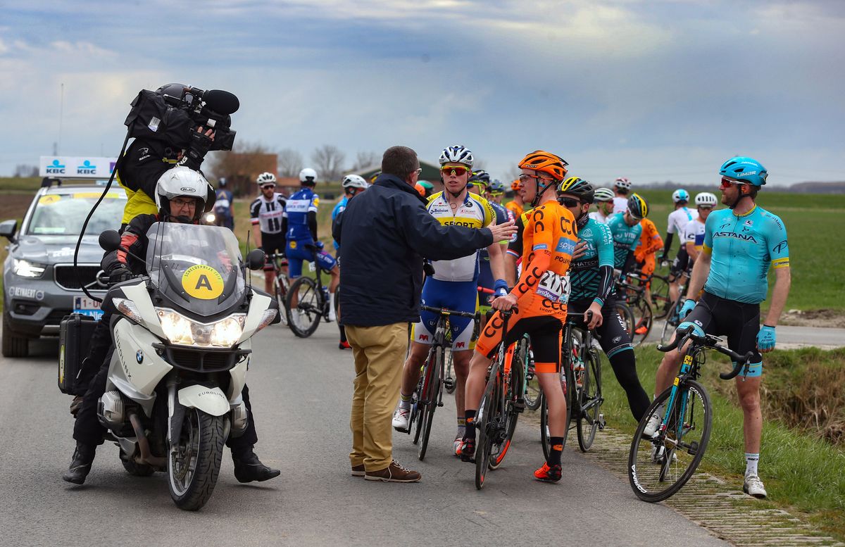 Riders are informed of their disqualification from the Scheldeprijs
