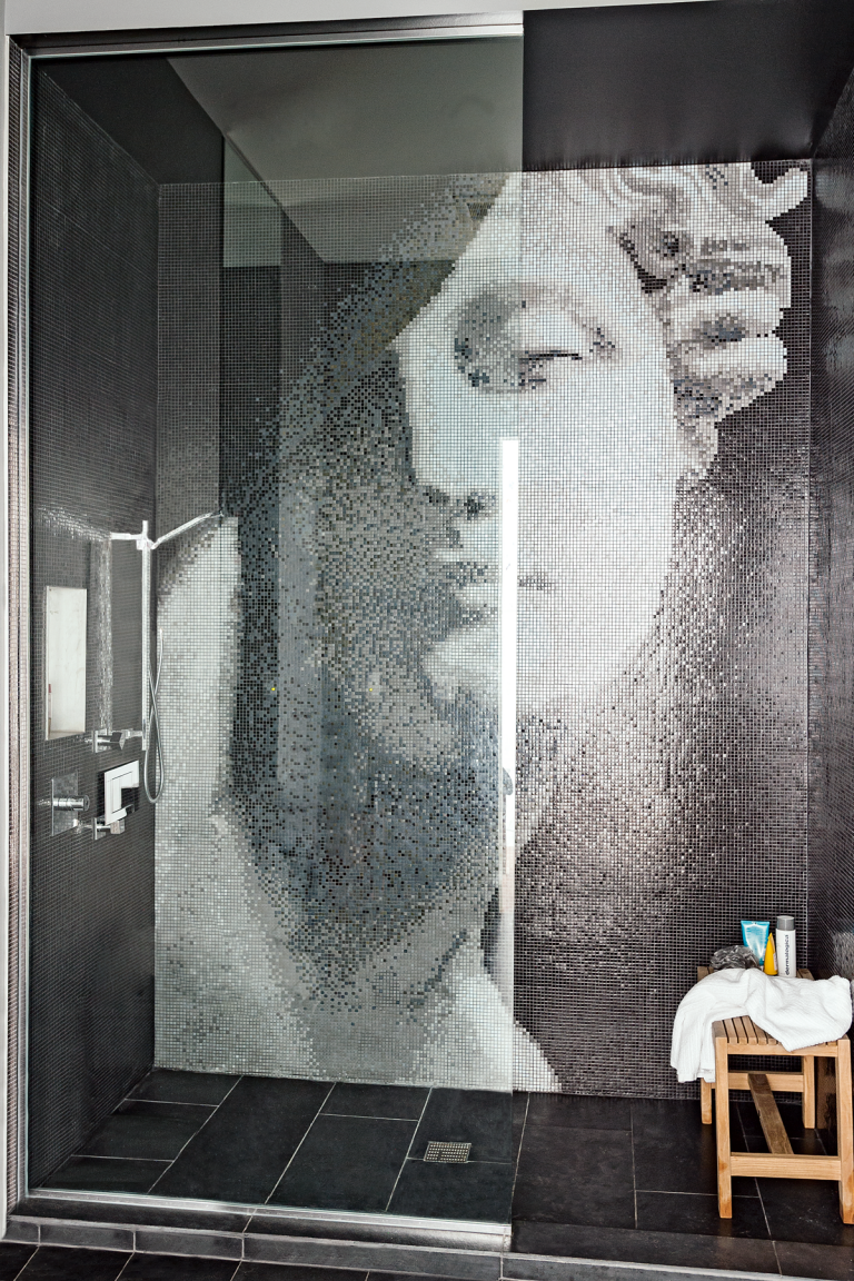 walk in shower with mosaic mural