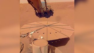 Photo of NASA's InSight Mars lander with dust-covered solar array on April 24, 2022..