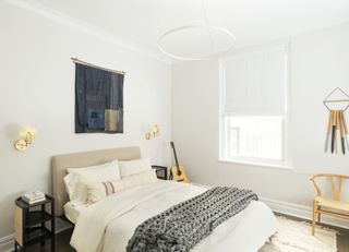 A master bedroom with a laid-back, casual vibe