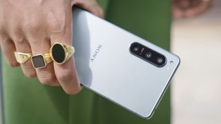 A Sony Xperia 5 IV from the back, in someone's hand