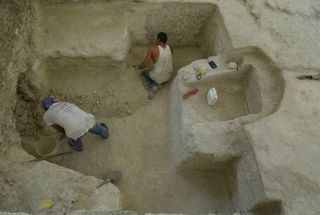 Archaeologists excavate the ancient Maya bath in Guatemala.