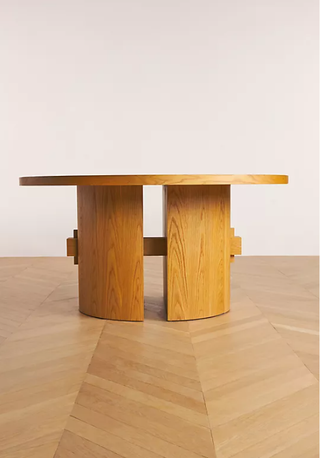 Mid-century roun dining table from Anthropologie.