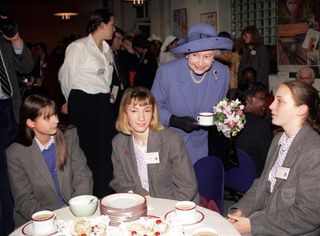 Queen Enoying A Cup Of Tea During A Visit To The Grey Coat Hospital in 1998 To Mark Its Tercentenary.