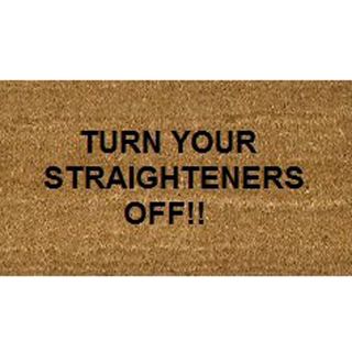 brown colour doormat with text turn your straightener off