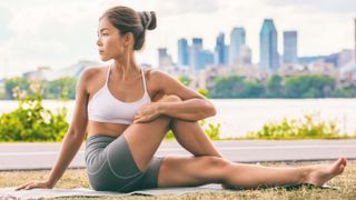 a photo of a woman doing a hip stretch