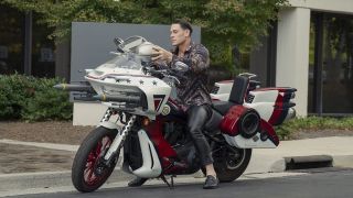 Chris Smith sitting on his Peace-Cycle in Peacemaker season 2 episode 6