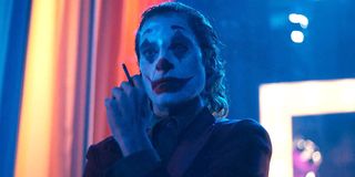 Joker 2019 movie Joaquin Phoenix holds cigarette