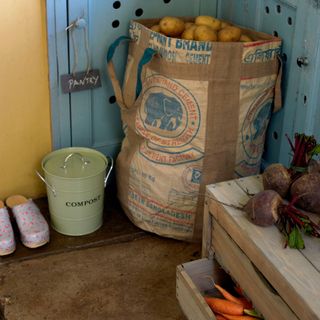 kitchen room with shoes and potato bag