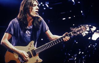 Photo of AC DC and Malcolm YOUNG and AC/DC, Malcolm Young performing live onstage, playing Gretsch 6131 Jet Firebird guitar, circa 1991