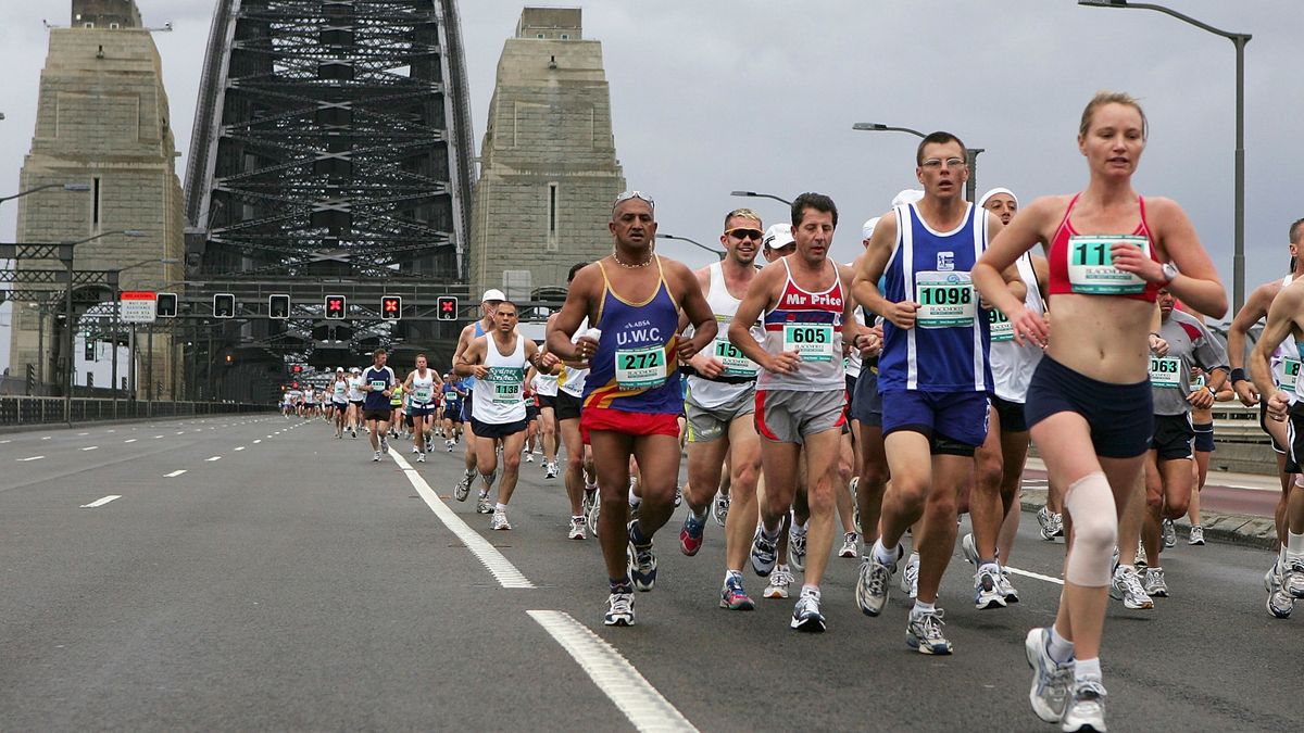 Runners cross the Harbour Bridge ahead of the Sydney Marathon live stream 2023