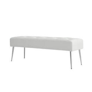 A white bench with metal legs