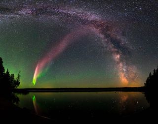 This composite image shows STEVE alongside the Milky Way over Childs Lake, Manitoba, Canada. 