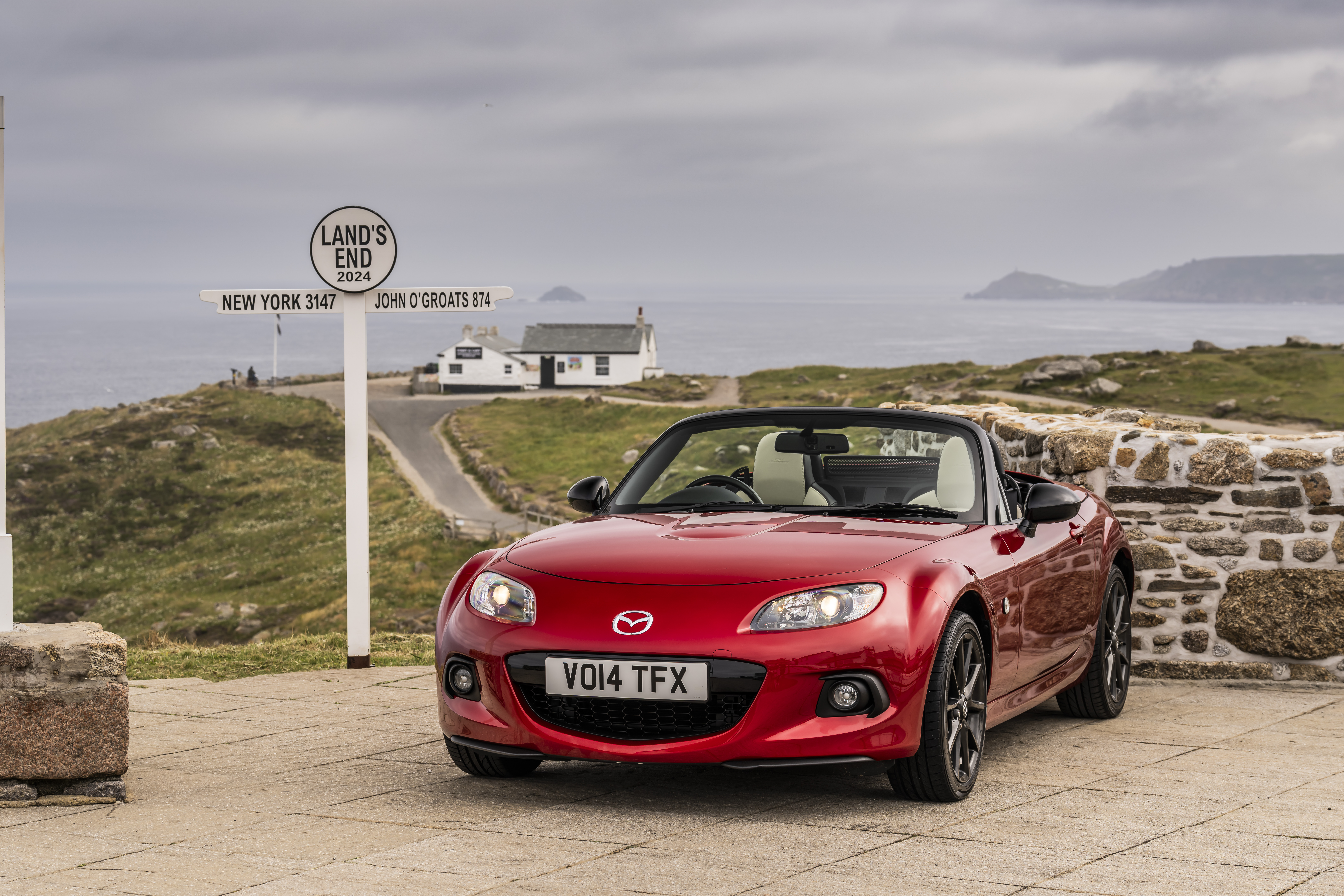 A mazda MX5, zooming through great britain