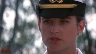 close up of Demi Moore's face, where a Navy hat in A Few Good Men