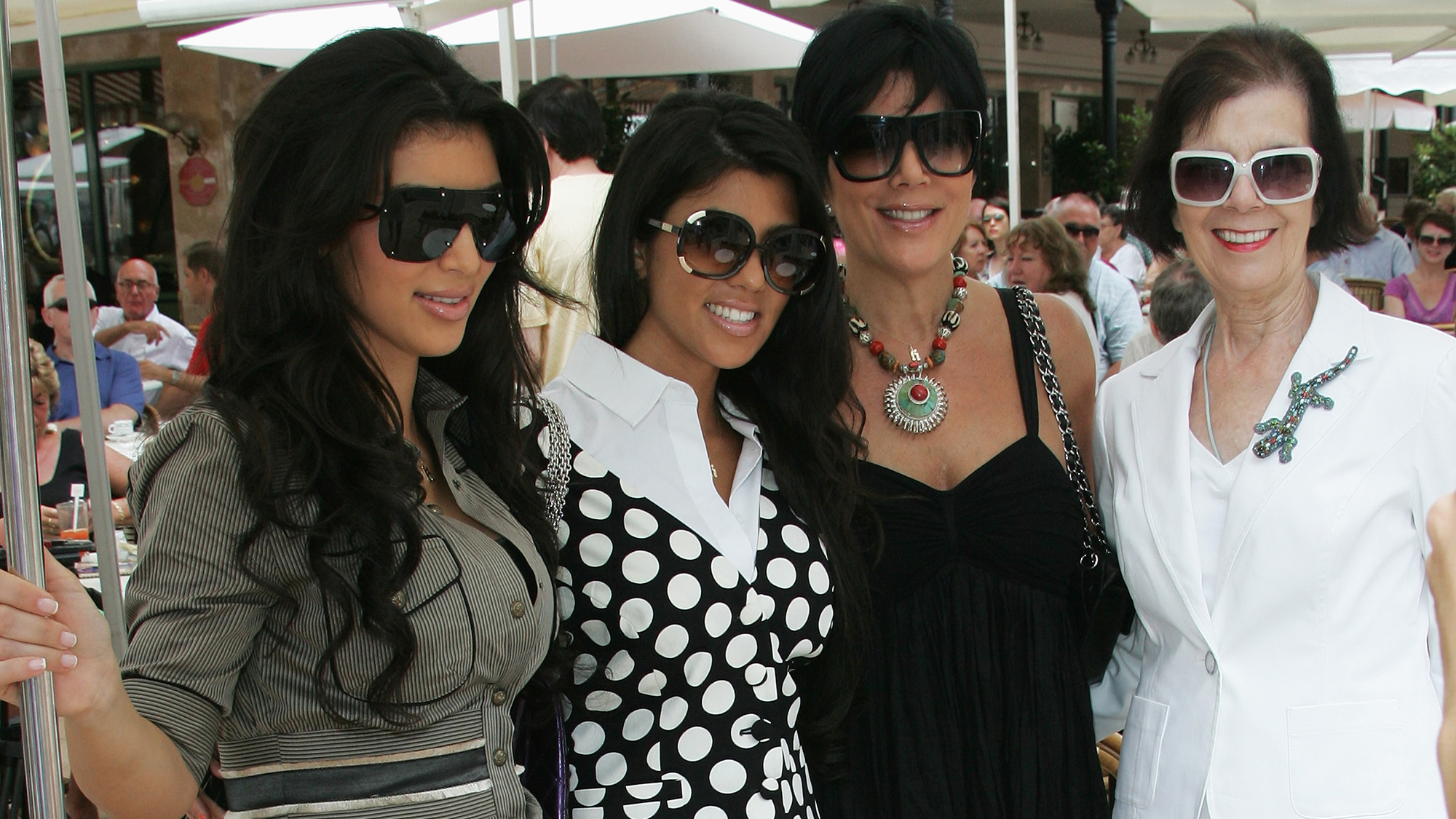 Kim Kardashian, Kourtney Kardashian, Kris Jenner and MJ Shannon pose for a picture in sunglasses before her death at 91.