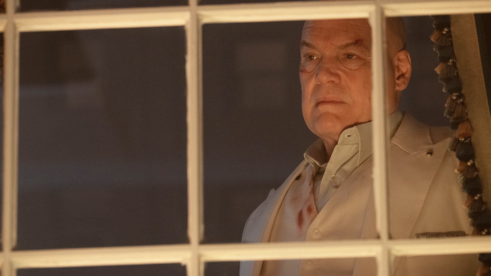 Wilson Fisk looking out of a window at night in Daredevil: Born Again season 2 episode 6
