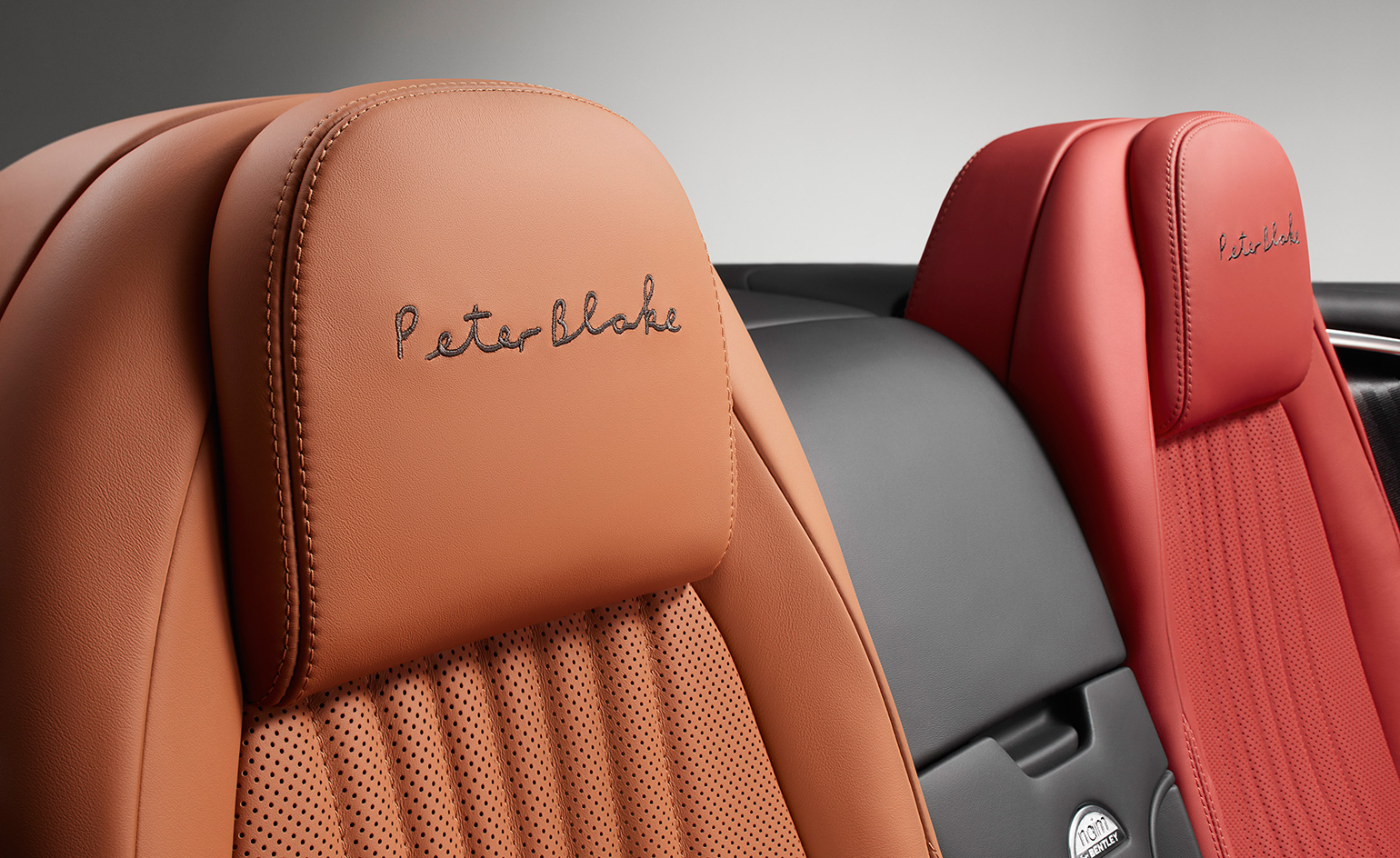 The interior is playful, with each leather seat trimmed in different colour hides, a combination of Cumbrian green, imperial blue, Newmarket tan and hotspur