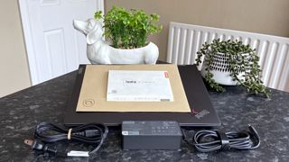 Lenovo ThinkPad X1 Yoga (Gen 8) box contents organised on a table top
