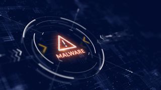 Malware concept image showing digital interface with warning symbol flagging malware compromise.