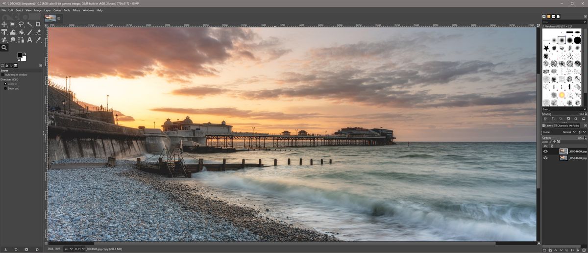 Screenshot of GIMP software editing a picture of a beach at sunset