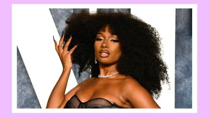 Megan Thee Stallion is pictured attending the 2023 Vanity Fair Oscar Party Hosted By Radhika Jones at Wallis Annenberg Center for the Performing Arts on March 12, 2023 in Beverly Hills, California/ in a purple template