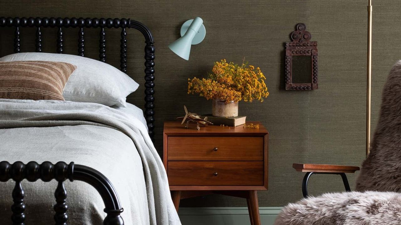 A cozy bedroom color scheme of dark greens, black and browns