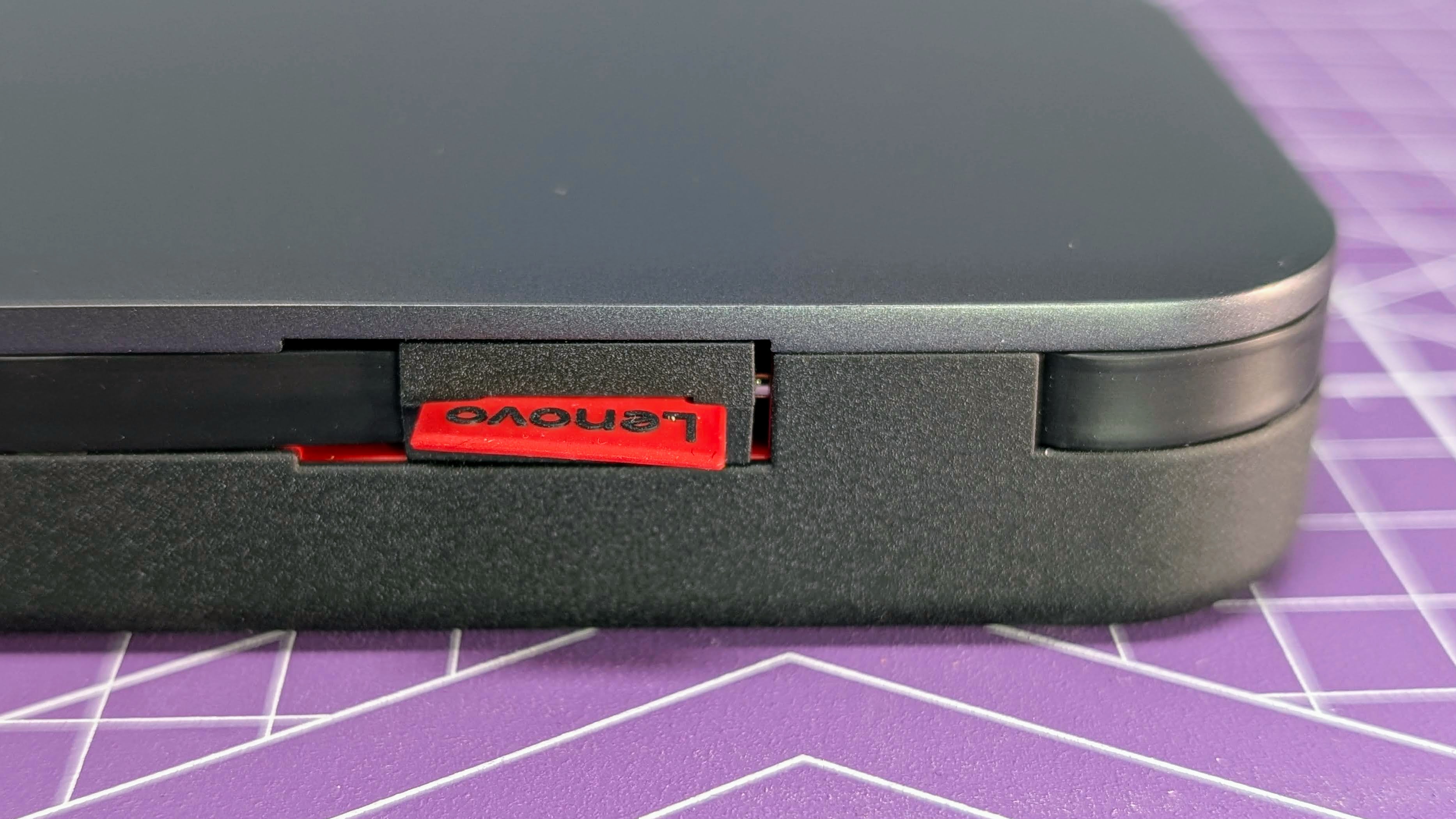 Lenovo Go USB-C laptop power bank close up from the side showing the tucked away USB-C cable