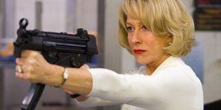 Helen Mirren holding a gun in Red