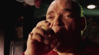 Irwin Keyes sucking on an inhaler in Intolerable Cruelty