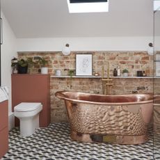 bathroom with copper bathtub